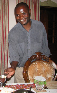 Elias Maale serves tea.